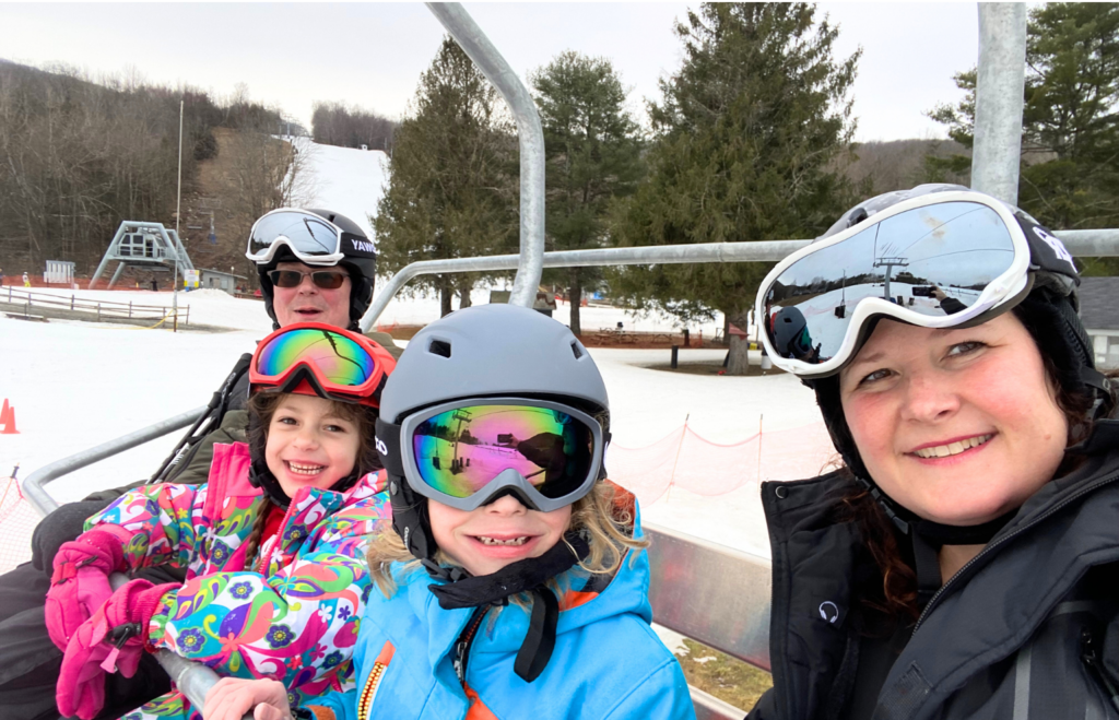 Family on ski lift