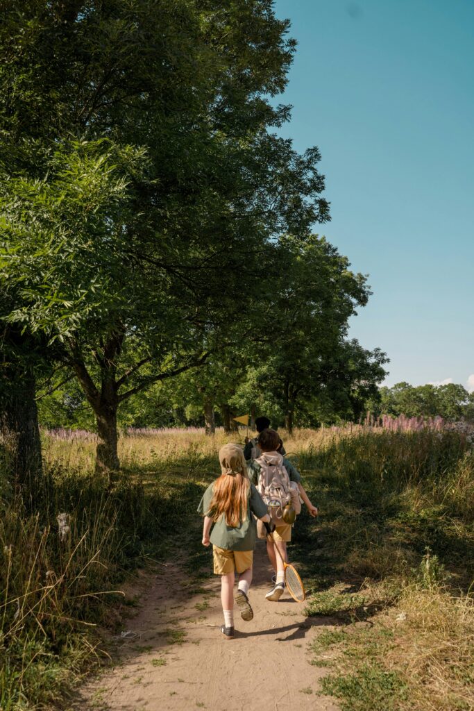 Family hiking in the woods for Mother's Day