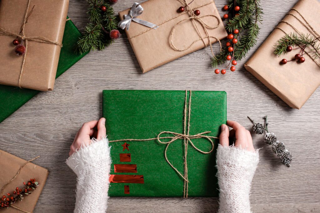 Holiday presents wrapped in green paper